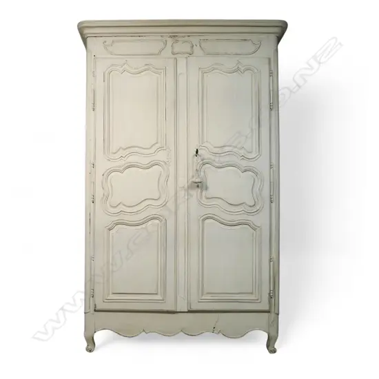 A 19thC French carved and white painted armoire,