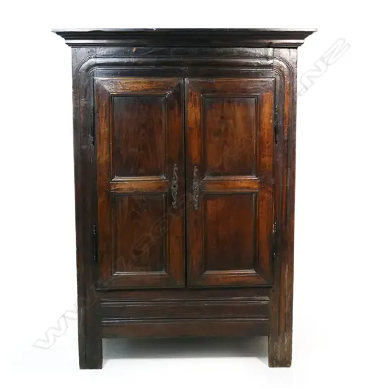 A 19thC Continental fruit wood armoire,