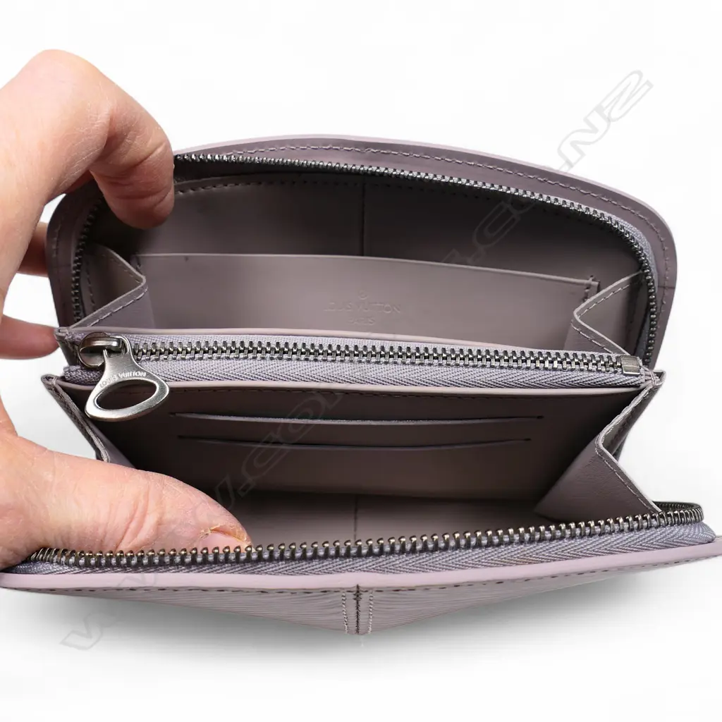 A Louis Vuitton lilac Epi leather Demi-Lune zip wallet, Image 1++