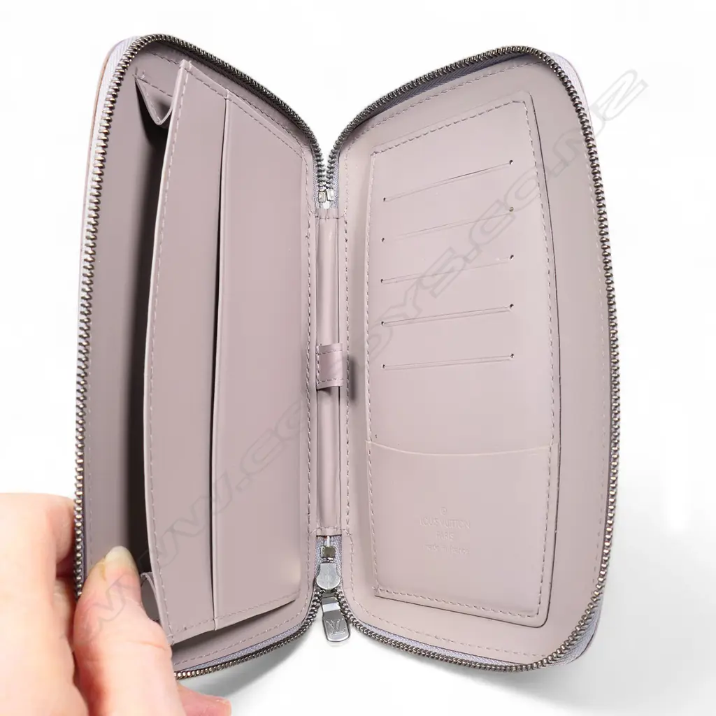A Louis Vuitton lilac Epi leather geode organiser zippy wallet, Image 1++