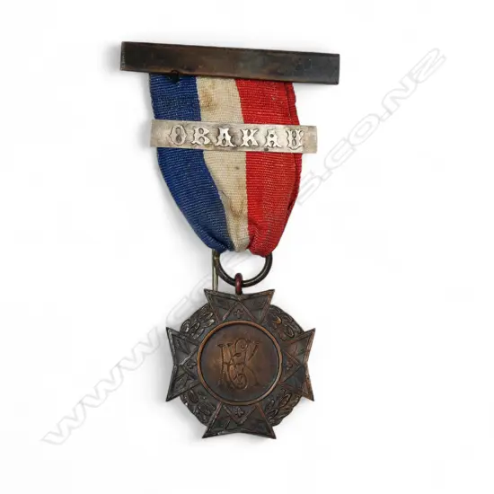 A King’s Empire Veteran’s medal named to ‘J A Capper, Wellington’,