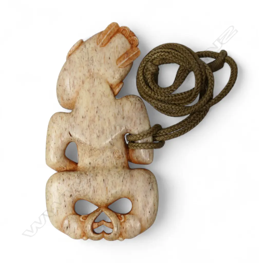 Stacy Gordine (1970-) (Ngāti Porou) carved whalebone wahine hei tiki Image 1++