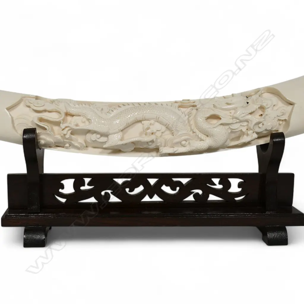 An ivory tusk with carved decoration, Image 1++