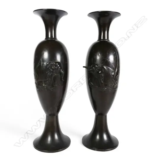 A pair of Japanese Meiji period tall elegant bronze vases,