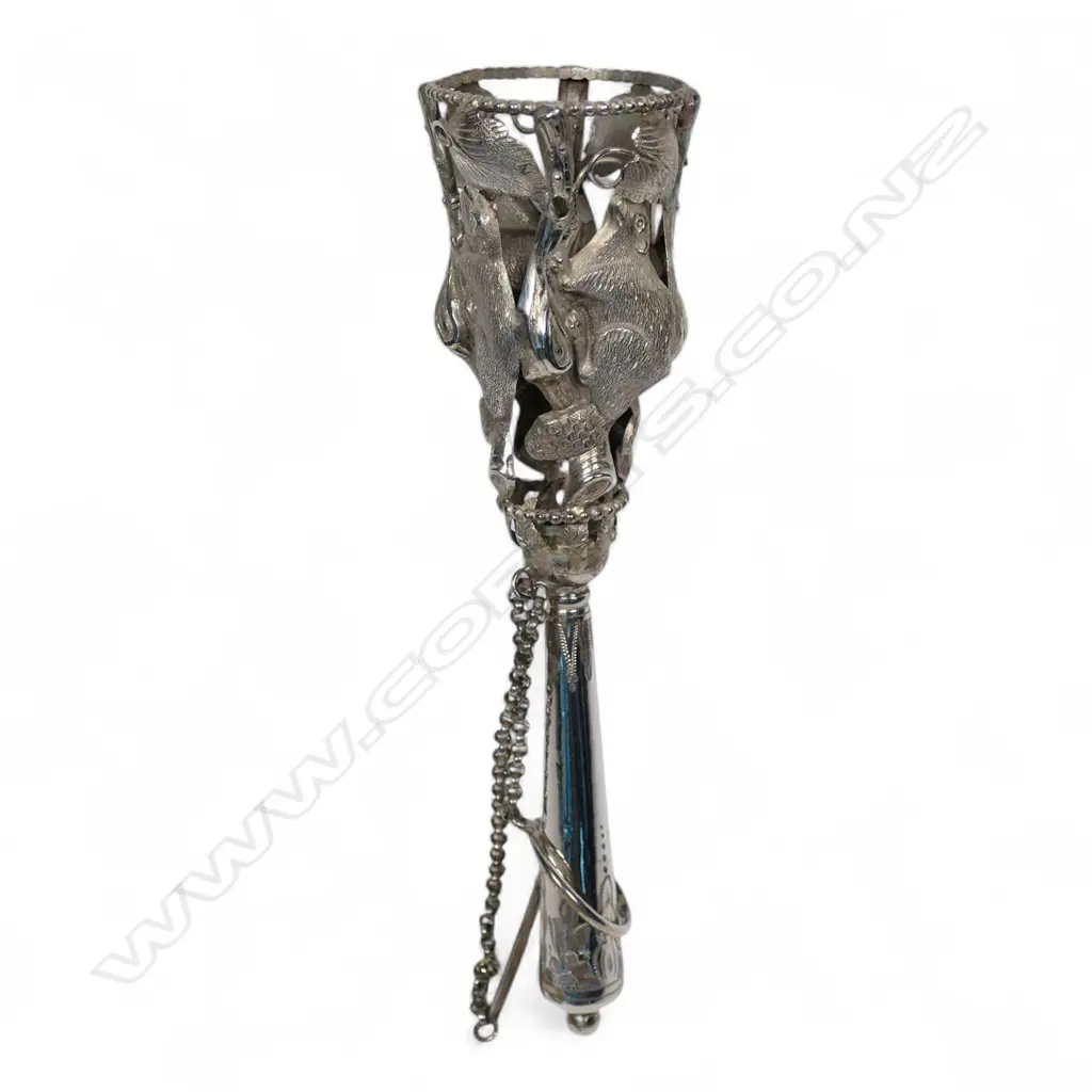 A possibly Canadian unmarked silver posy holder with beaver panels, Image 1++