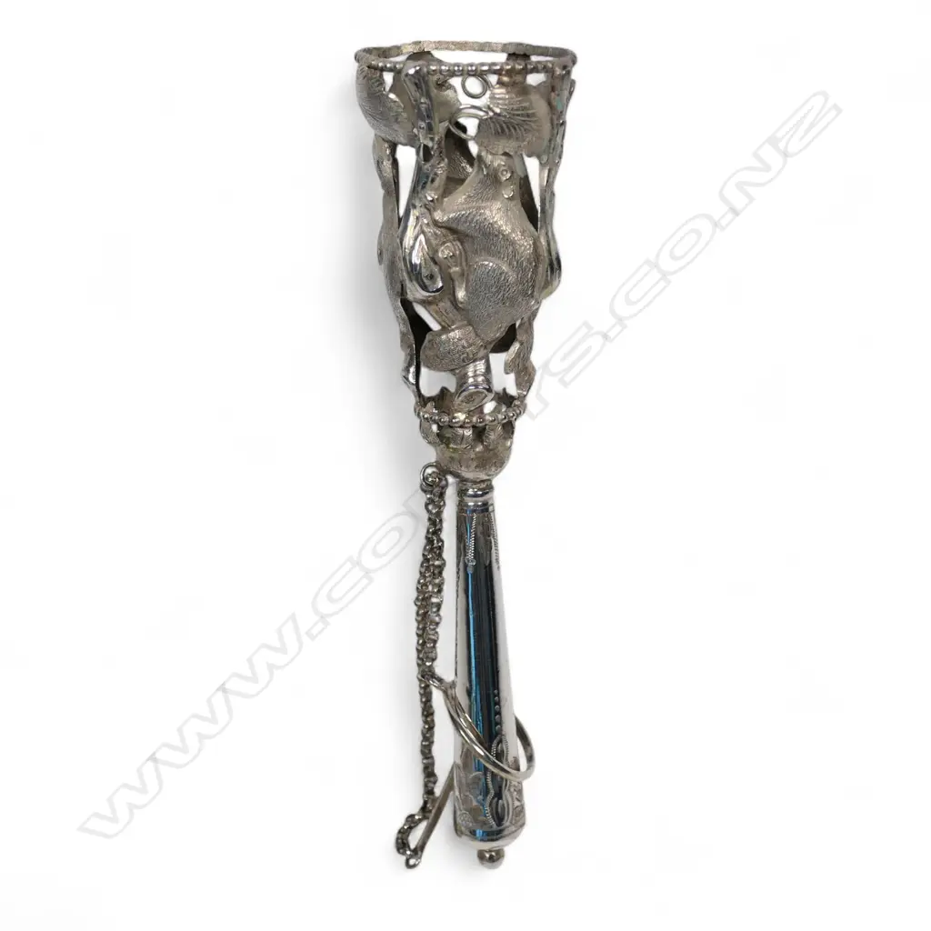 A possibly Canadian unmarked silver posy holder with beaver panels, Image 1++
