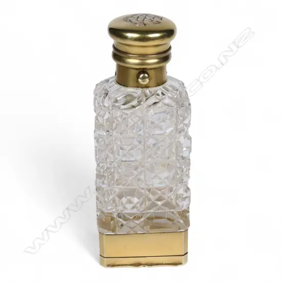 A quality Victorian silver gilt and cut crystal smelling salts combination vinaigrette,