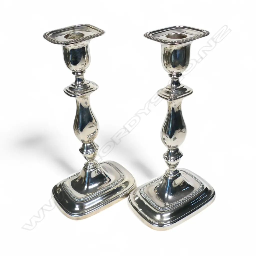A pair of 1920's silver Georgian style loaded column candlesticks, Image 1++
