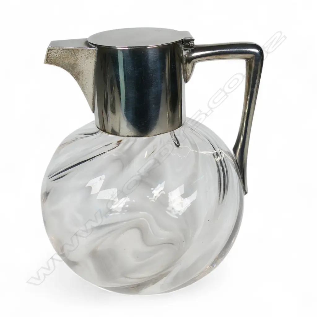 A late Victorian Christopher Dresser design silver and glass claret jug, Image 1++