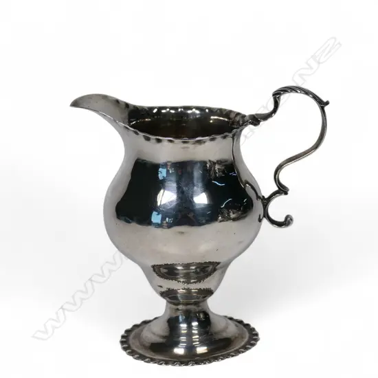 A George III silver cream jug,