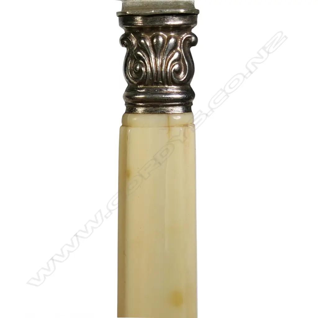 A set of twelve 19thC French silver and ivory handled knives, Image 1++