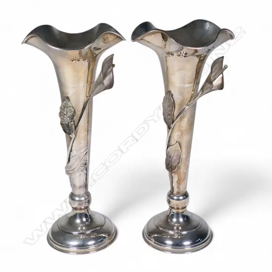 A pair of Indonesian silver trumpet vases,