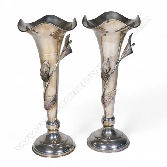 A pair of Indonesian silver trumpet vases,