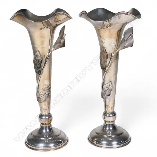 A pair of Indonesian silver trumpet vases,