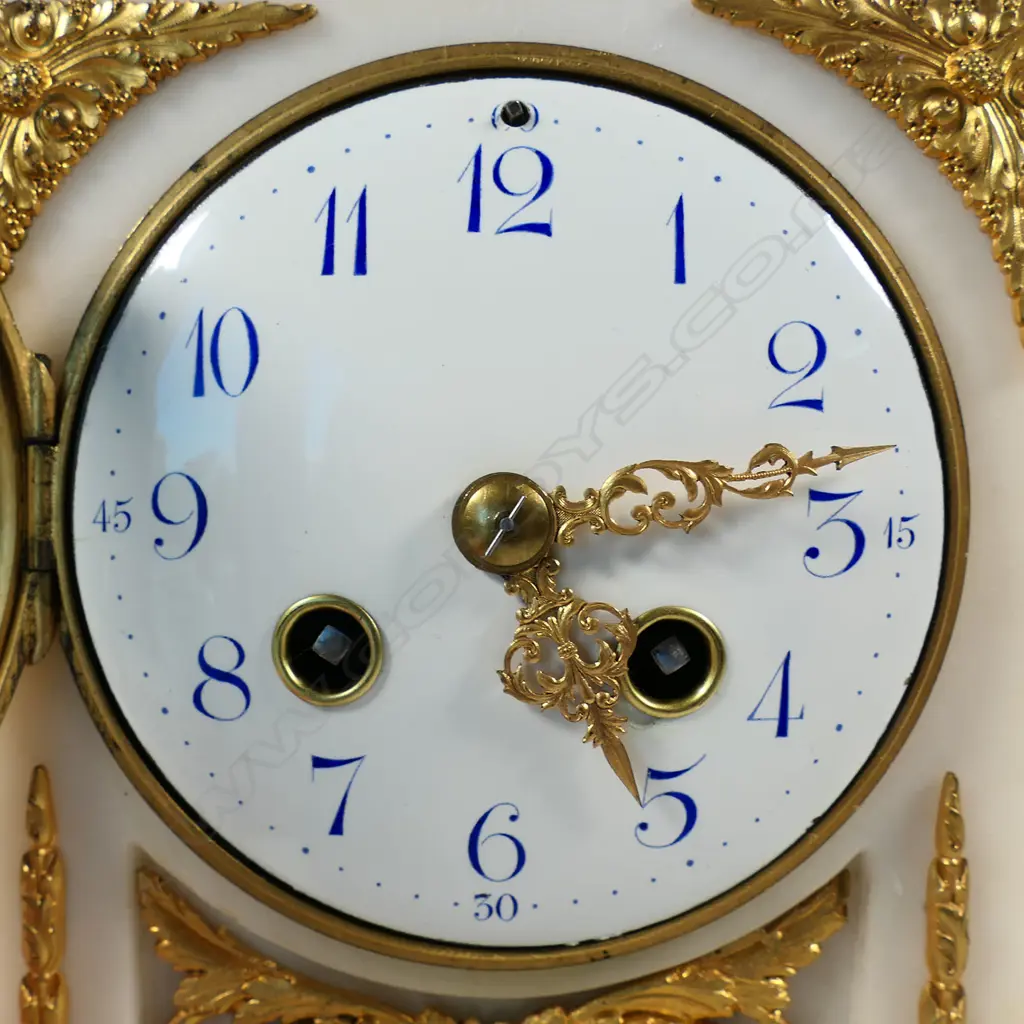 A 19thC French white marble and ormolu mantel clock, Image 1++