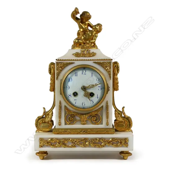 A 19thC French white marble and ormolu mantel clock,