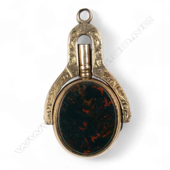 A Victorian 9ct rose gold fob spinner watch key,