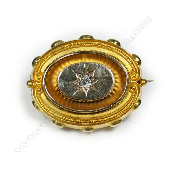 A quality late 19thC Etruscan style 9ct bright gilded rose gold and diamond brooch,