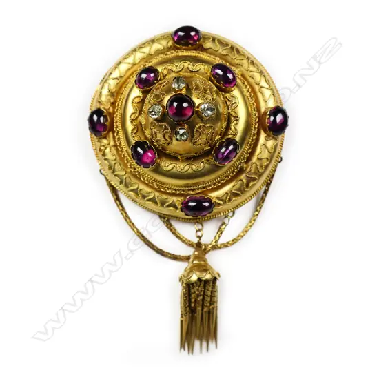 An impressive large 19thC bright gilded 9ct gold fancy brooch,