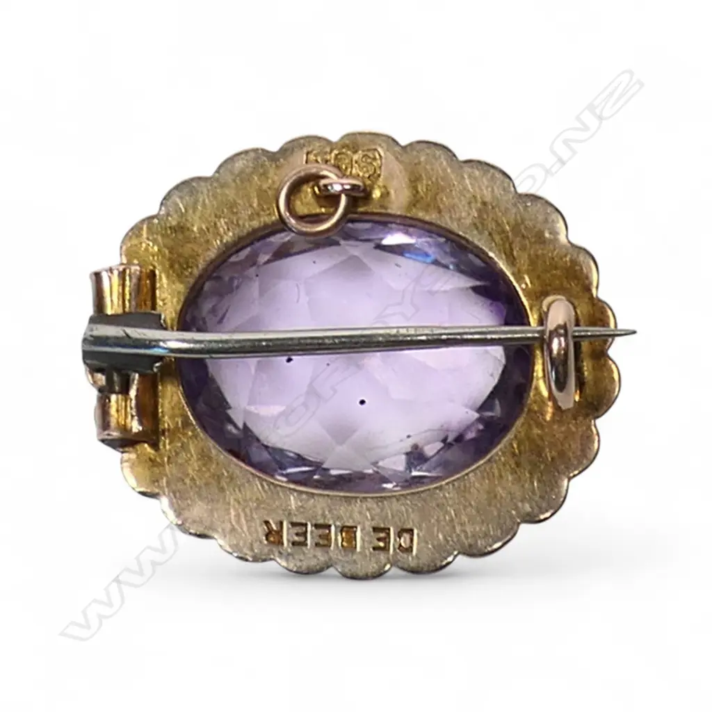 An early 19thC 'De Beer' 9ct yellow gold amethyst and seed pearl oval brooch, Image 1++