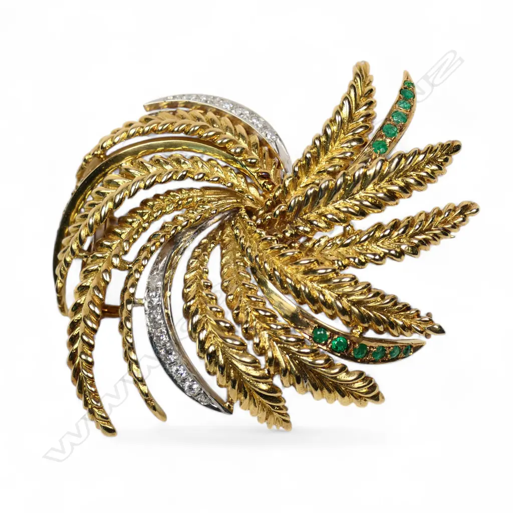 A 14ct gold emerald and diamond brooch, Image 1++