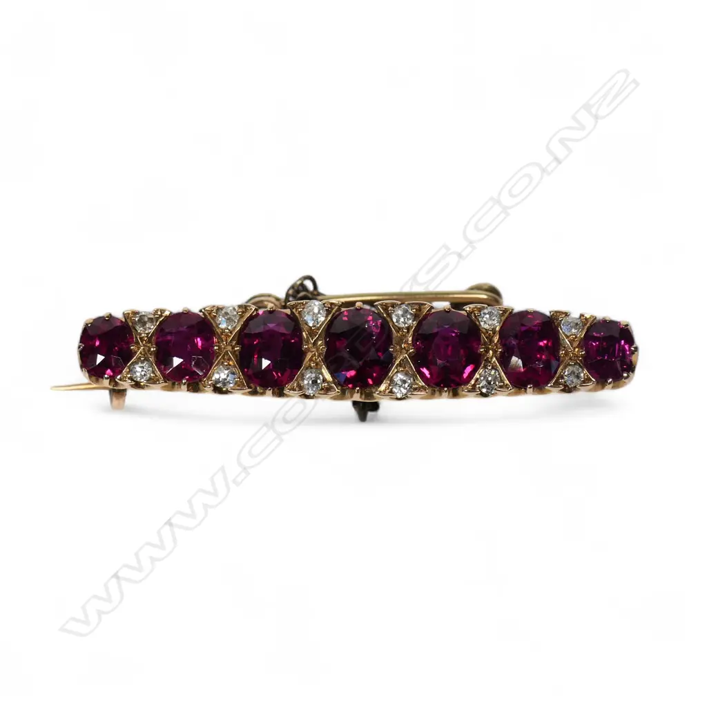 An estate 15ct gold ruby and diamond brooch, Image 1++