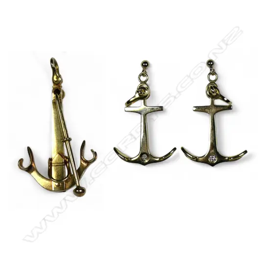 A 14ct gold anchor pendant and 9ct gold earring set,