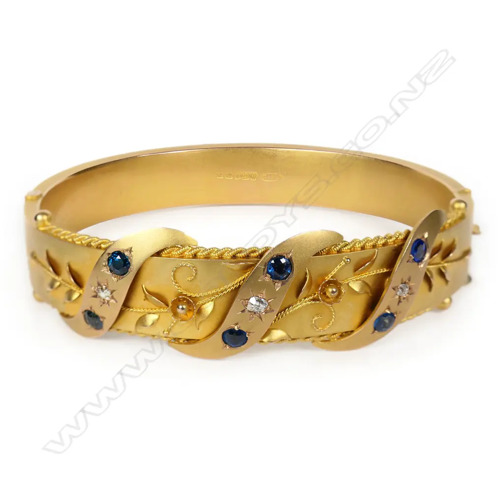 A Victorian 9ct gold diamond and sapphire hinged bangle, Image 1++