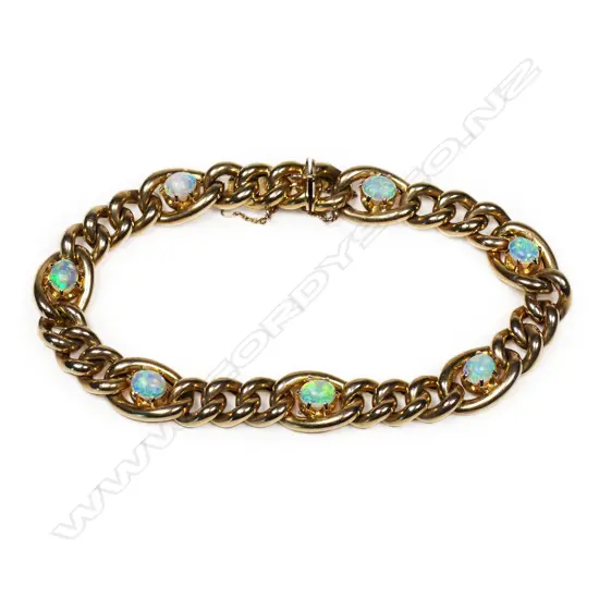 An Edwardian 15ct rose gold and opal bracelet,