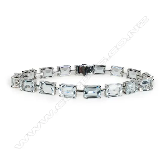 A 9ct white gold and aquamarine bracelet,