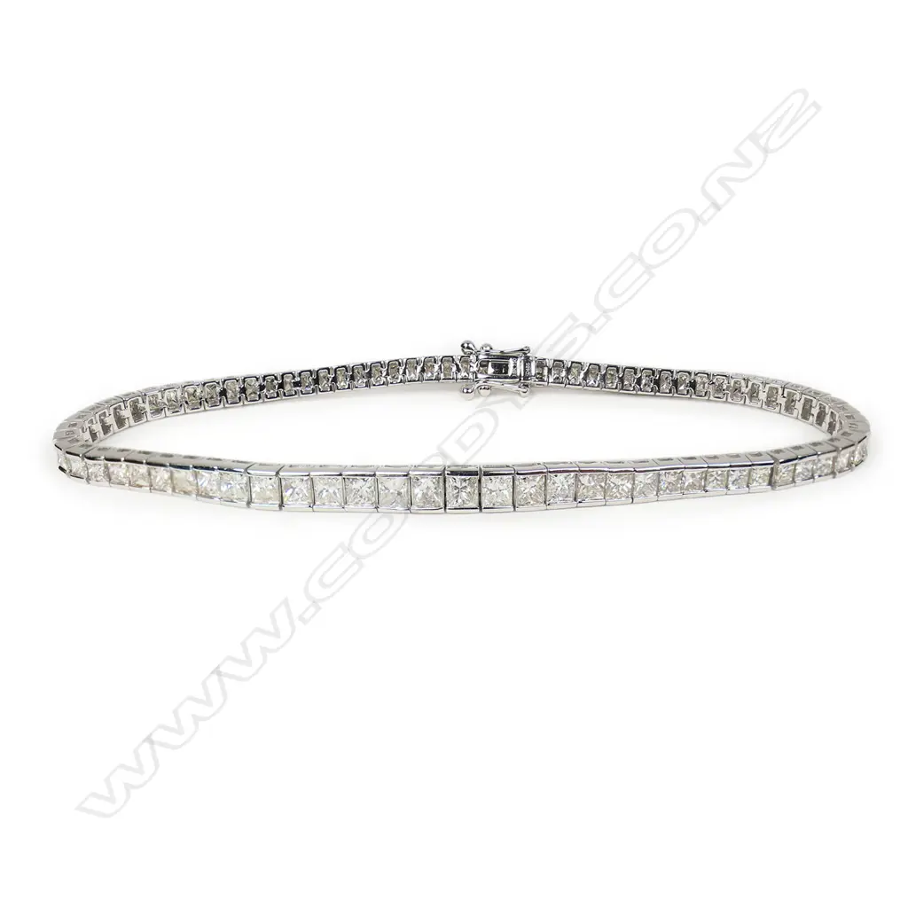 A modern 18ct white gold and diamond line bracelet, Image 1++