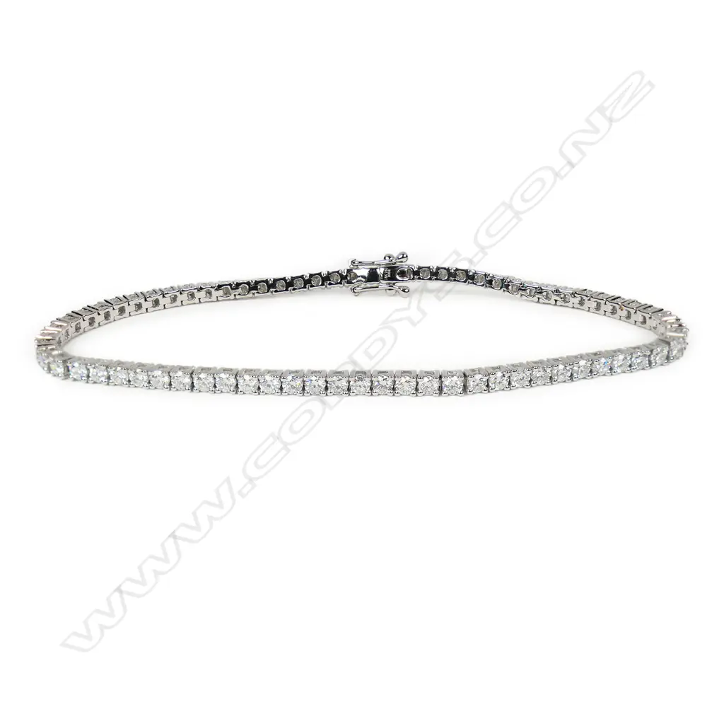 An 18ct white gold and diamond tennis bracelet, Image 1++