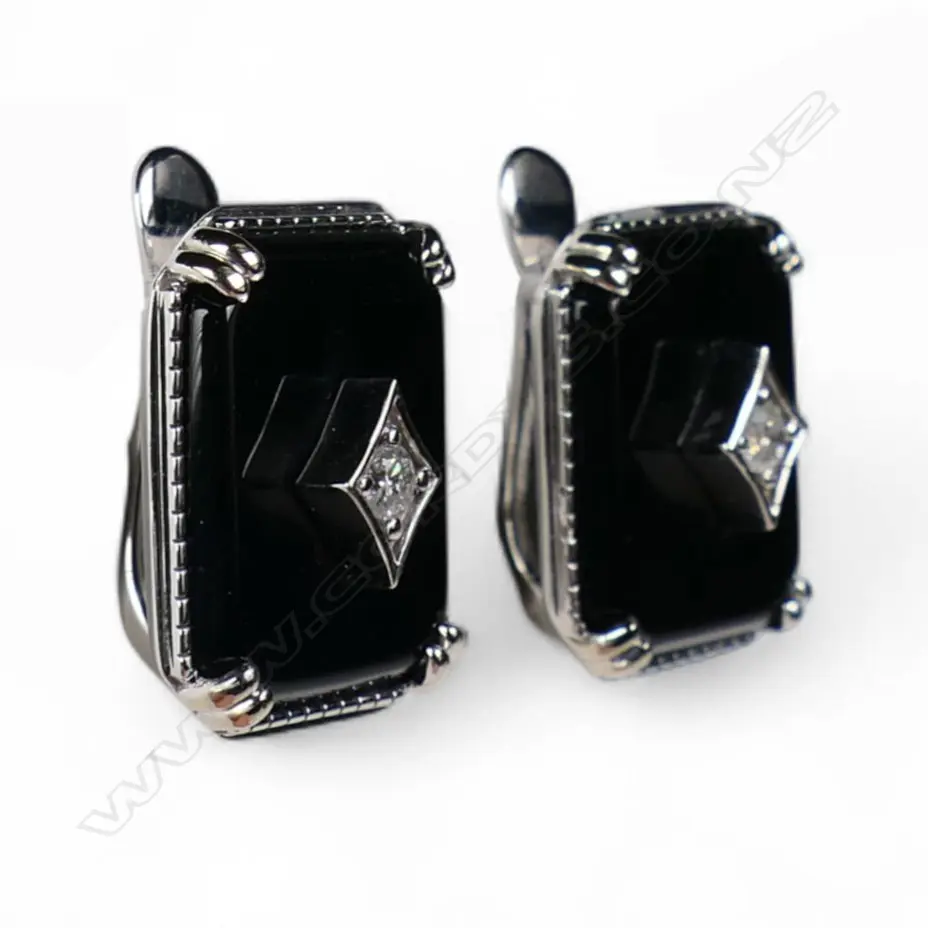 A pair of 14ct white gold onyx and diamond Art Deco style earrings, Image 1++