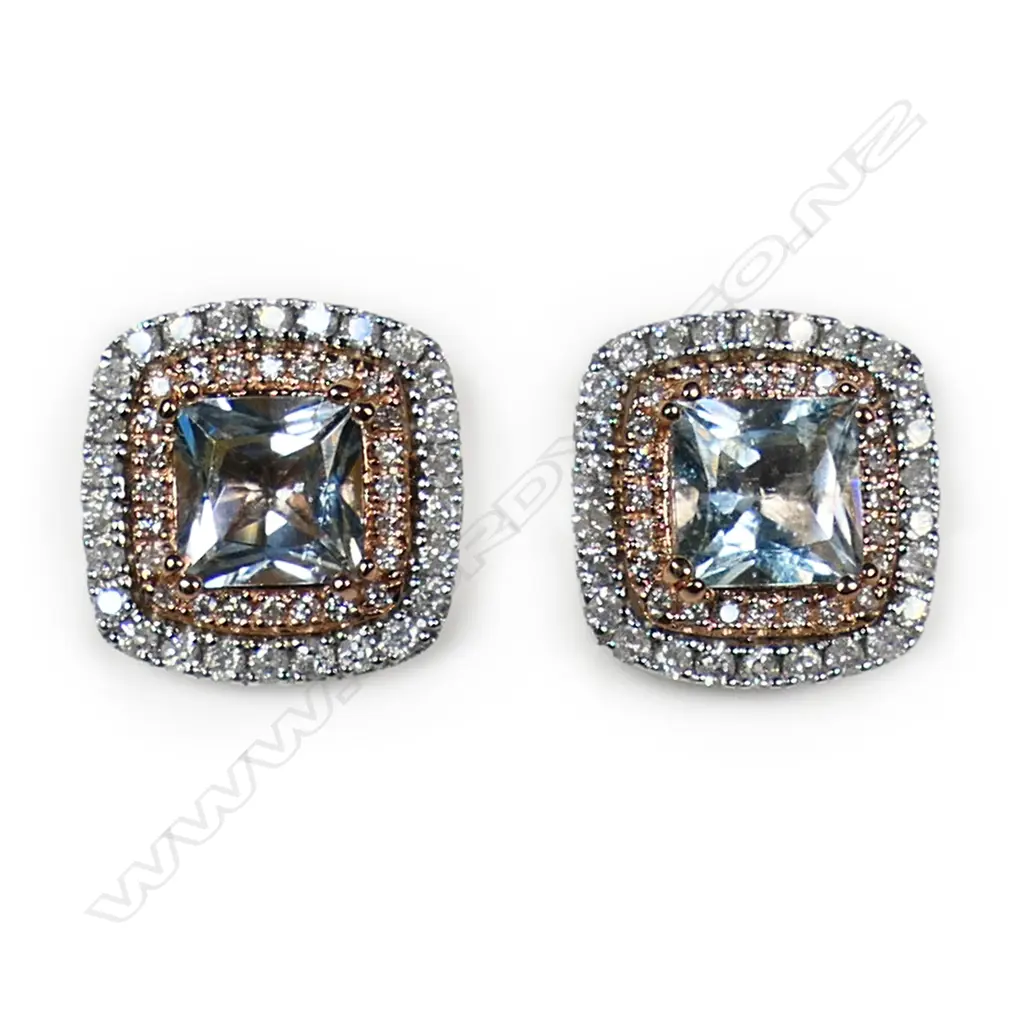 A pair of 14ct white and rose gold aquamarine and diamond halo stud earrings, Image 1++