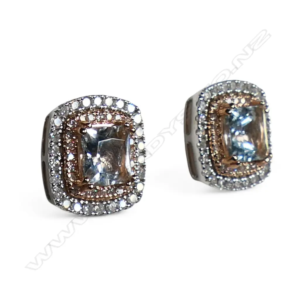 A pair of 14ct white and rose gold aquamarine and diamond halo stud earrings, Image 1++