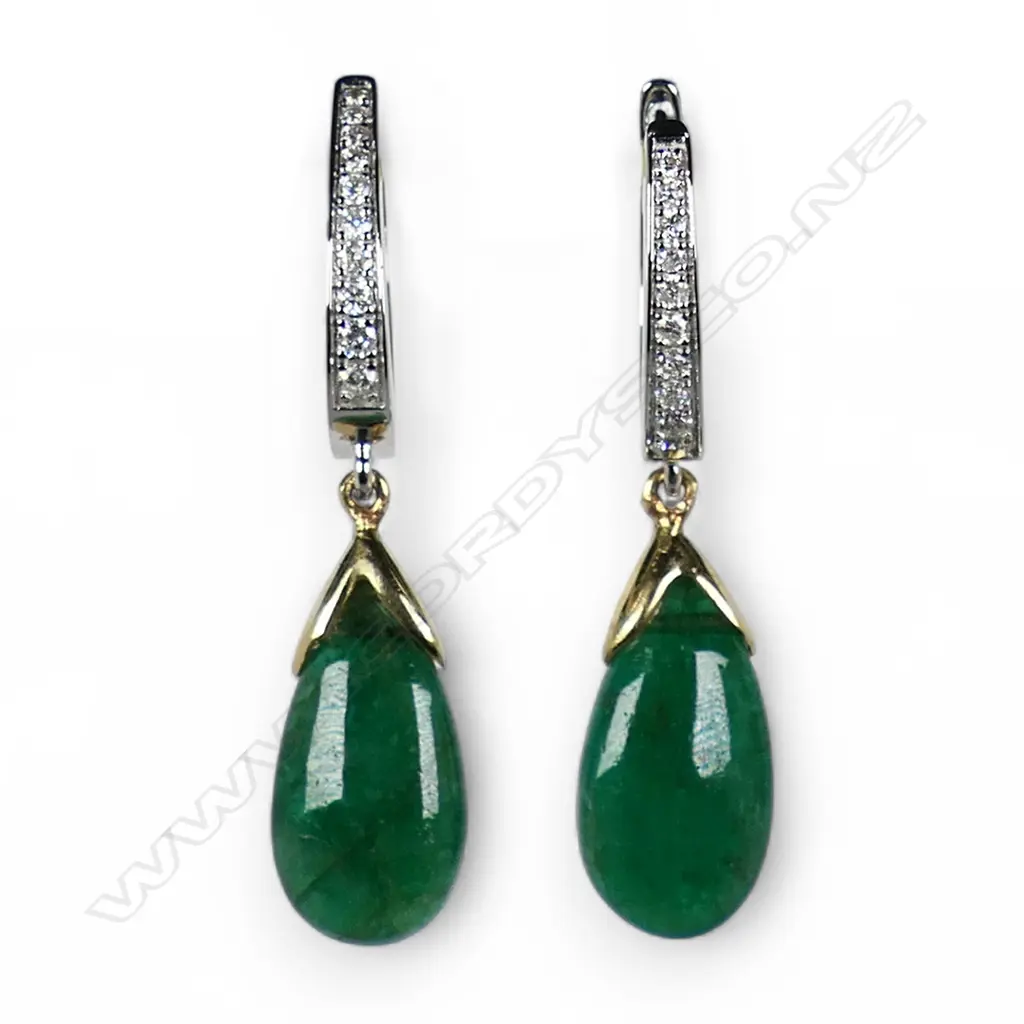A pair of 18ct white gold emerald and diamond earrings, Image 1++