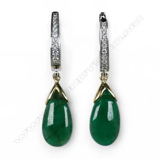 A pair of 18ct white gold emerald and diamond earrings,