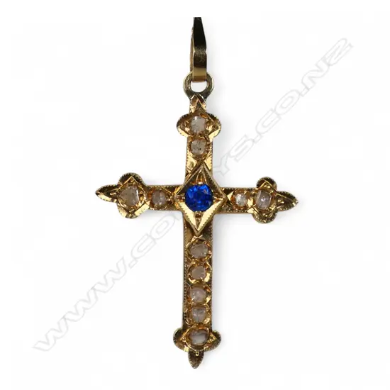 A vintage 18ct yellow gold and gem set cross pendant