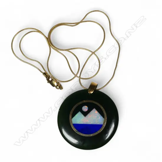 An artist made 18ct gold pounamu opal and gem set pendant on chain,