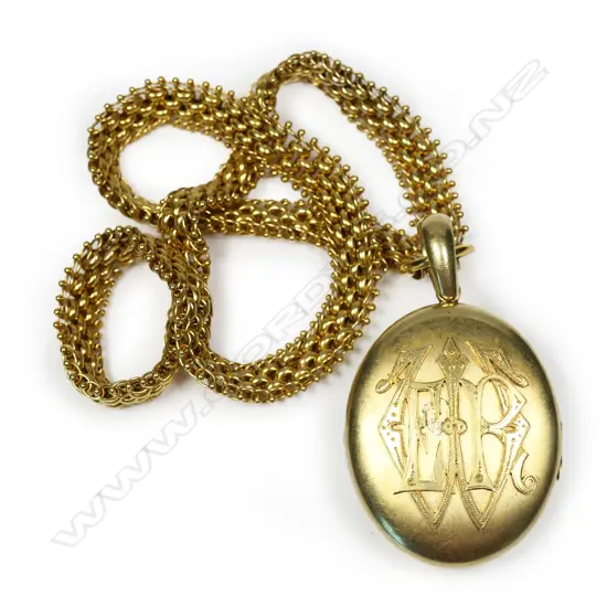 A superb Victorian 15ct gold mayoral type large locket and chain,