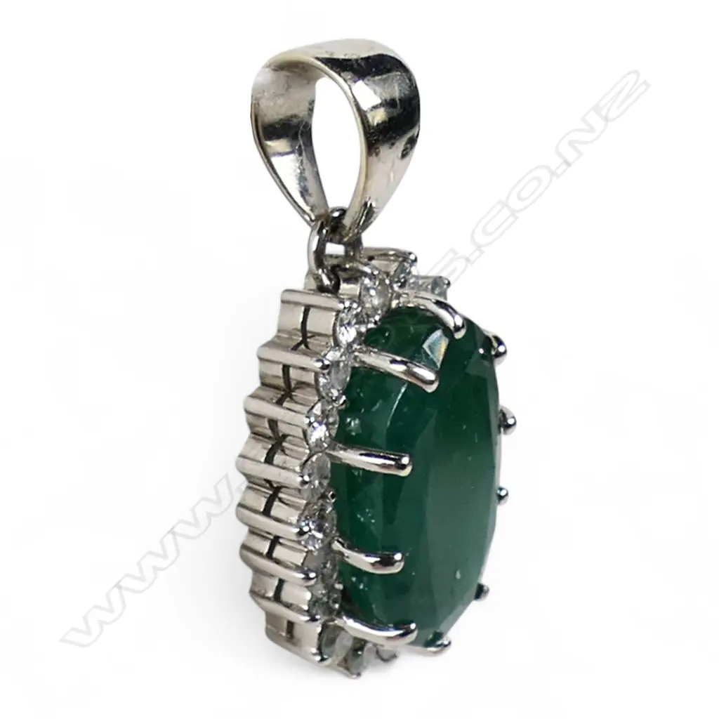 An 18ct white gold emerald and diamond pendant, Image 1++