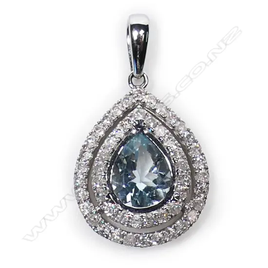 A 14ct white gold aquamarine and diamond double halo pendant,