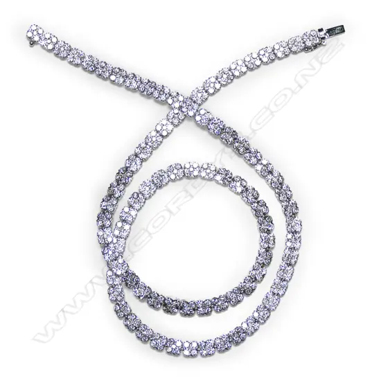 An impressive fully diamond set graduating necklace,