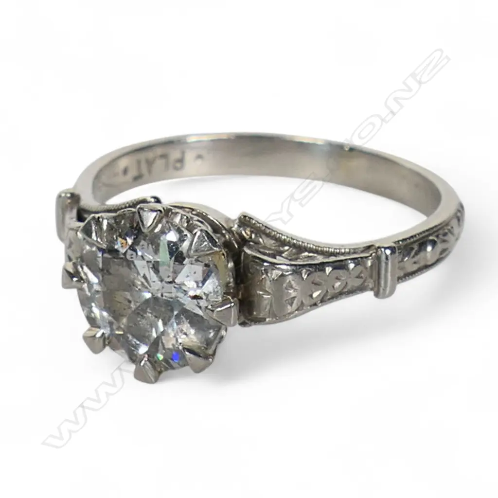An estate platinum and diamond solitaire ring, Image 1++