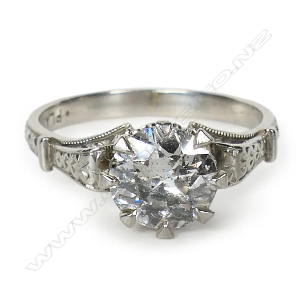 An estate platinum and diamond solitaire ring, Image 1++