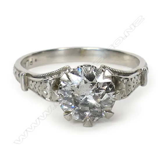 An estate platinum and diamond solitaire ring,