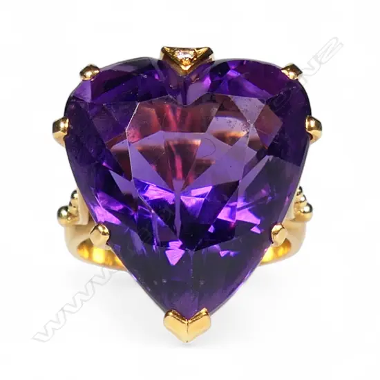 An 18ct yellow gold amethyst and diamond handmade ring,