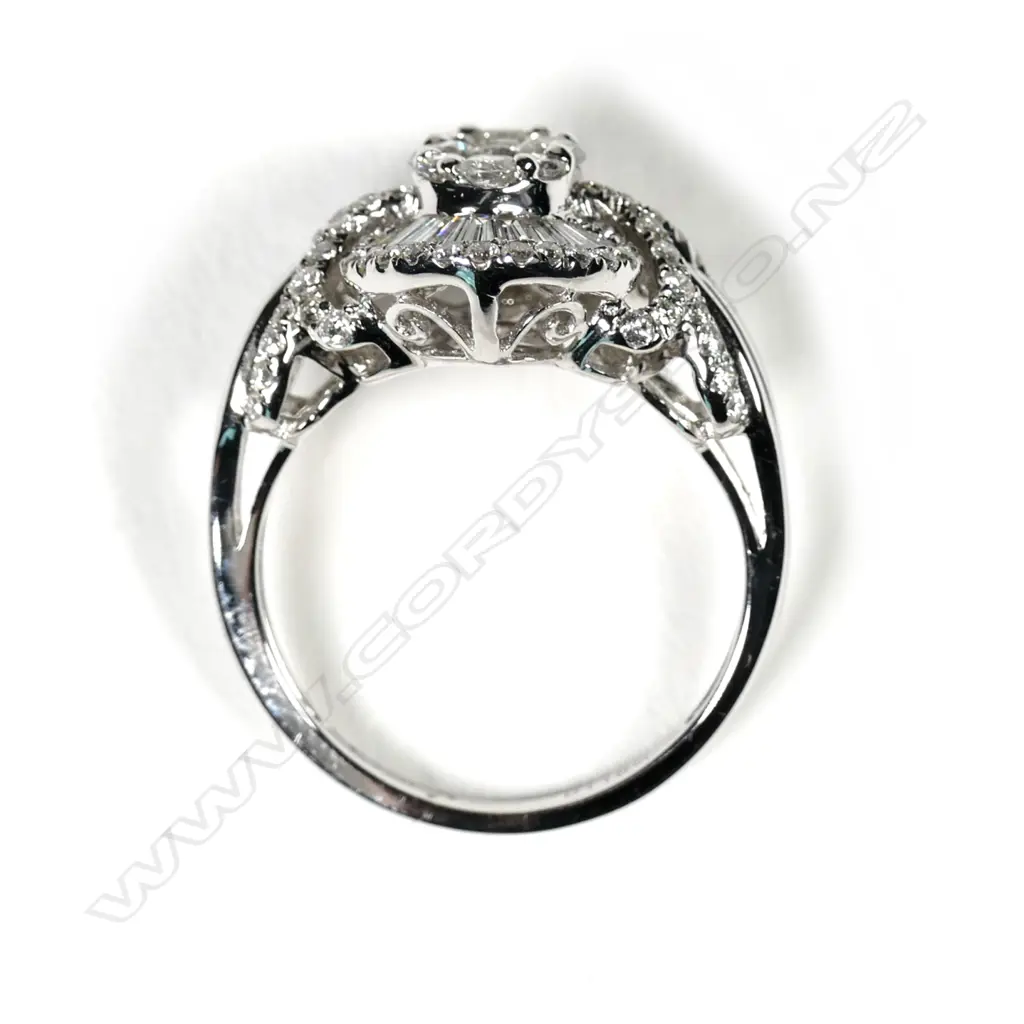 A modern 18ct white gold diamond cluster ring, Image 1++