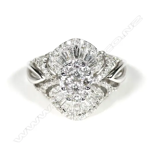 A modern 18ct white gold diamond cluster ring,