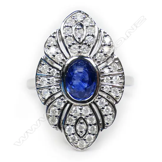 A 14ct white gold sapphire and diamond dress ring,